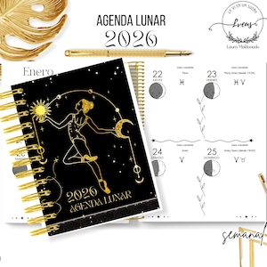 Puede incluir: Agenda lunar 2026 negra y dorada con encuadernación en espiral. La portada presenta una ilustración dorada de una mujer, el sol y la luna. Mide 17 cm x 21,6 cm.