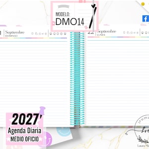 May include: An open 2027 daily planner with white lined pages, a turquoise spiral binding, and a gold pen. The pages feature the text 21 Septiembre DOMINGO and 22 Septiembre LUNES, with a pink label displaying 2027 Agenda Diaria MEDIO OFICIO.