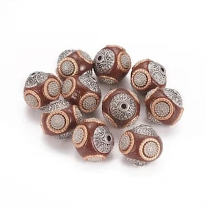 2 superb Indonesian beads in antique silver alloy 16x14 mm