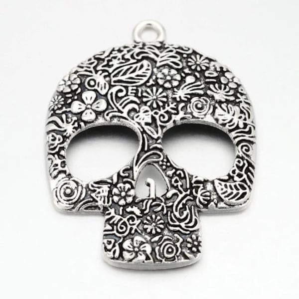 pendentif tete de mort en alliage de zinc 66x49x6mm