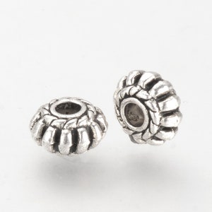 set of 20 Tibetan silver spacer beads 8x5 mm
