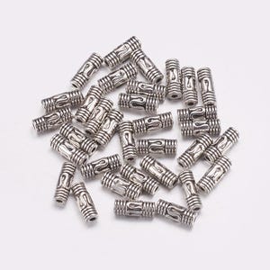lot of 25 tube beads 8x3 mm in Tibetan silver