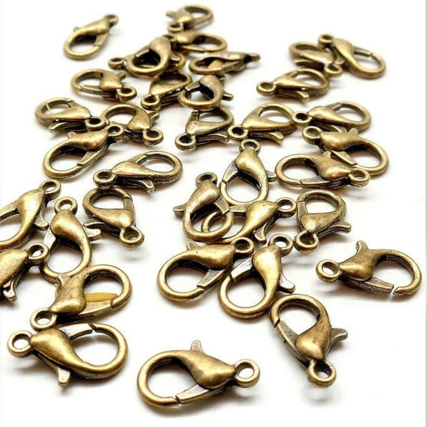 24 fermoirs mousquetons en laiton bronze 12x7 mm