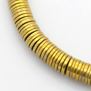 100 heishi hematite beads 6x1 mm gold color