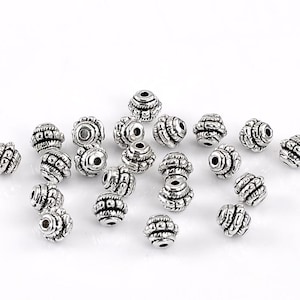 lot of 25 spacer beads Sculpted 7 mm in Tibetan silver