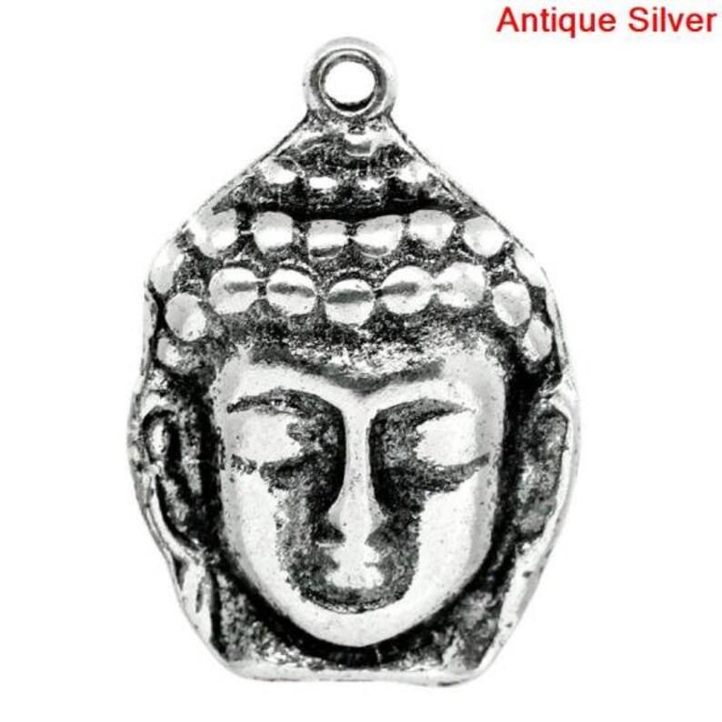 set of 2 Tibetan alloy Buddha charms 29x20 mm