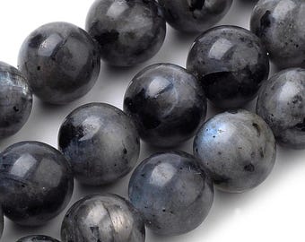 May include: A strand of round, dark gray labradorite beads. The beads have a smooth, polished finish and a subtle iridescent sheen.