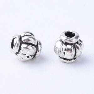 set of 40 lantern spacer beads 4x4 mm in Tibetan silver