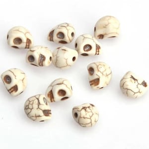 lot of 25 skull beads 8x7 mm in howlite