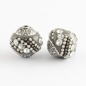 2 magníficas cuentas indonesias en aleación de plata antigua 16x14 mm