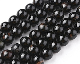 string of 24 natural tourmaline beads 8 mm