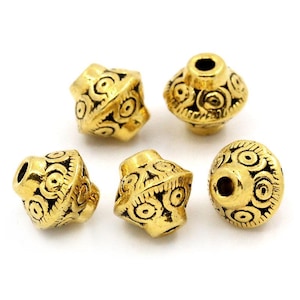 金メッキチベットシルバーのTOUPIESビーズ7mm20個セット
