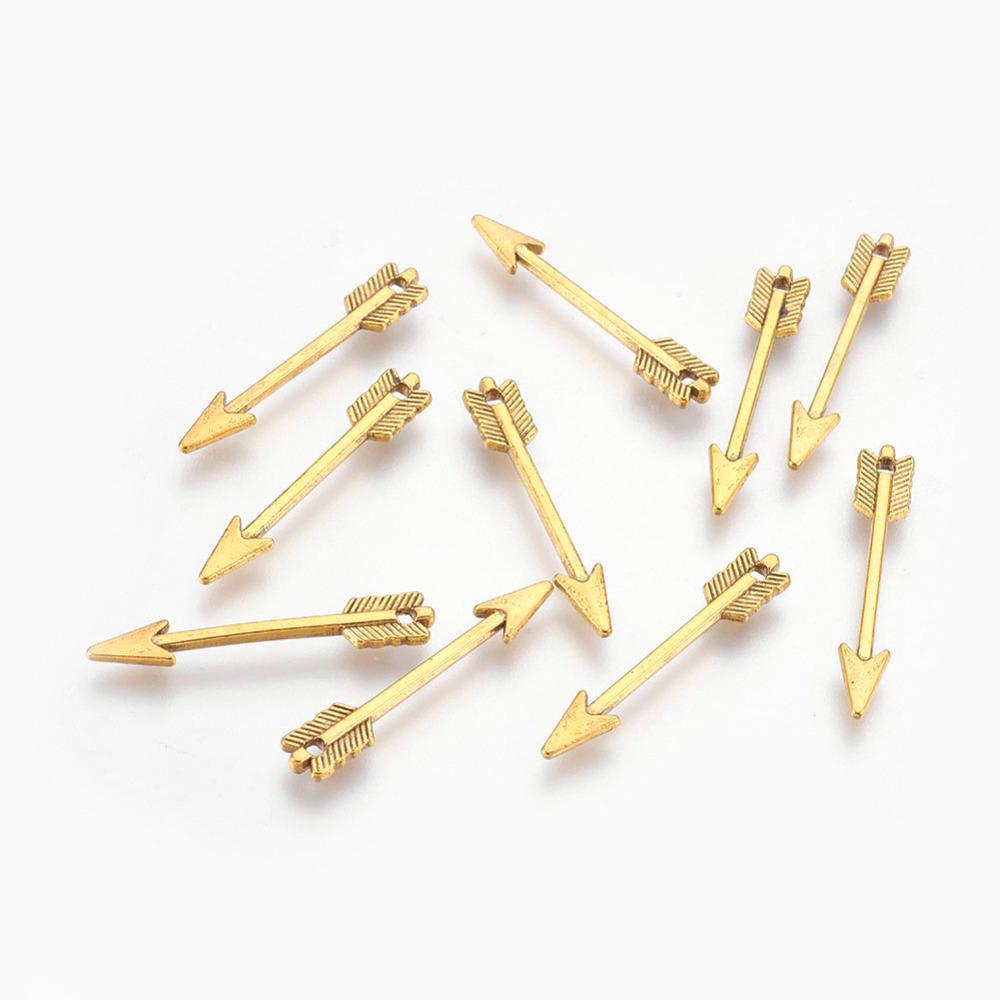 set of 8 Tibetan silver arrow pendants 29 mm gold-plated