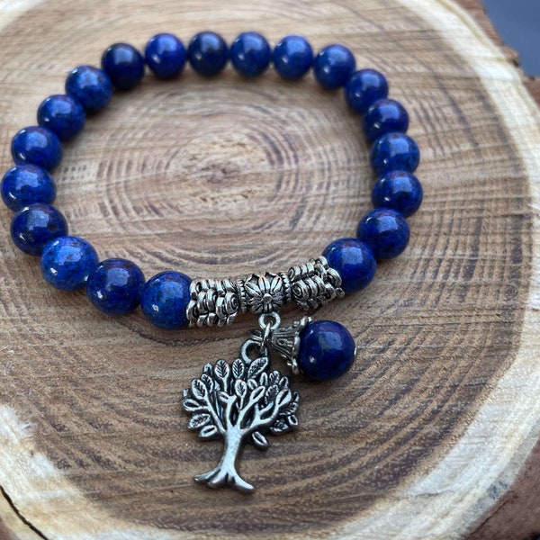 bracelet en perle lapis lazuli naturelle breloque et perles intercalaires en argent tibétain