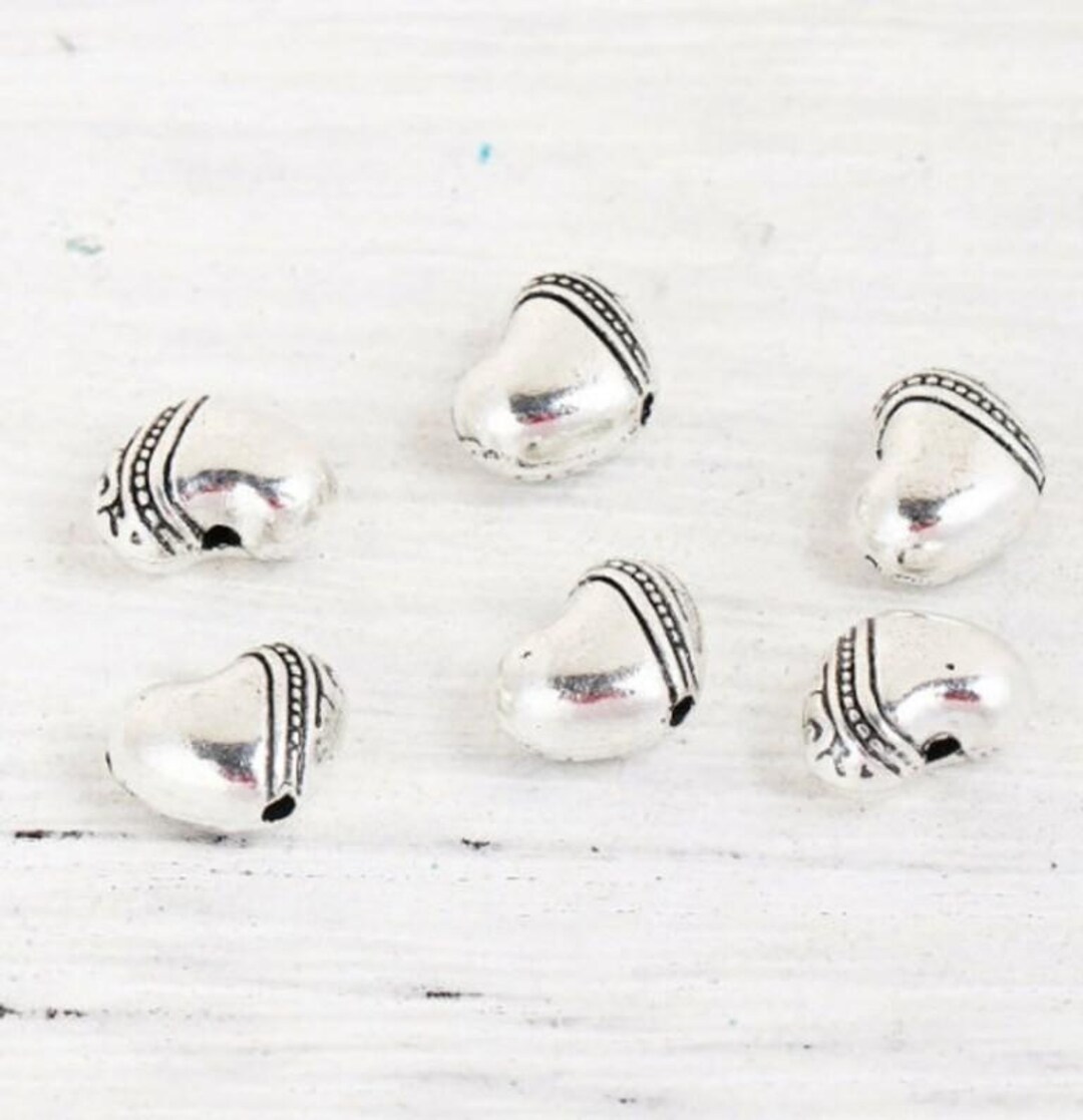 Distanziatore Tibetano Tondo Piatto Decorato Color Argento Diametro 0.9 - Foto 4