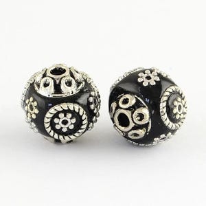 2 superb Indonesian beads in antique silver alloy 15x14 mm