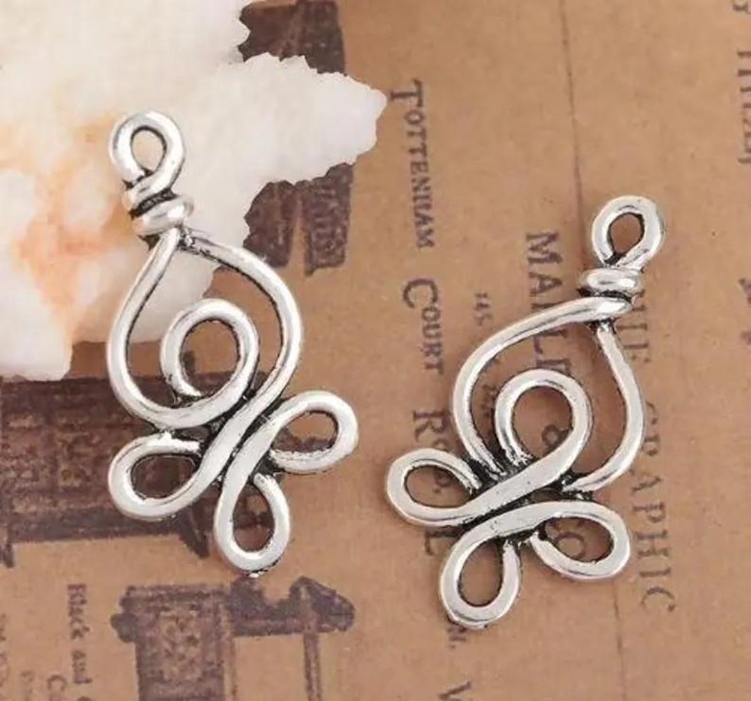 Orecchini pendenti con nodo celtico in argento sterling: gioielli