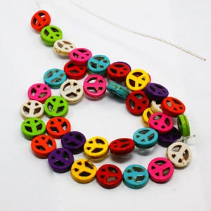 10 peace and love beads in howlite 10 mm