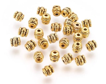 lot of 25 barrel beads 5x5 mm in gold-plated Tibetan silver