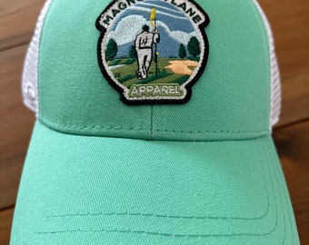 Seafoam green and white trucker style hat