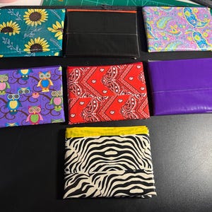 Cartera plegable con cinta adhesiva 2