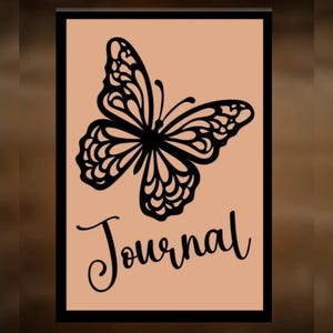 May include: A journal with a black butterfly design, the word "Journal" in cursive, and the text "For Hand Burning" and "CoolMoonDesigns". The design is on a peach-colored background, framed in black.