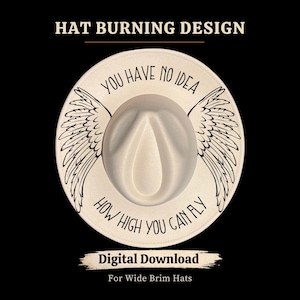May include: A cream-coloured wide-brimmed hat with a white crown and a black wing design on the brim. The text "YOU HAVE NO IDEA HOW HIGH YOU CAN FLY" is printed around the hat. The words "HAT BURNING DESIGN" and "DIGITAL DOWNLOAD For Wide Brim Hats" are also visible.