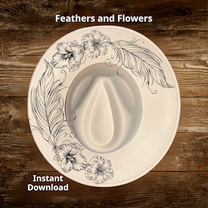 May include: Cream-colored fedora hat with black floral and feather design. The hat features the text "Feathers and Flowers" and "Instant Download". The hat is a stylish accessory.