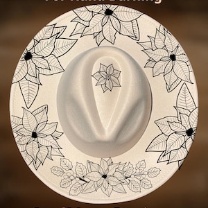 May include: A cream-coloured fedora hat featuring black floral patterns around the brim and a central flower. The text "For Hand Burning" and "CoolMoonDesigns" are printed on the hat.