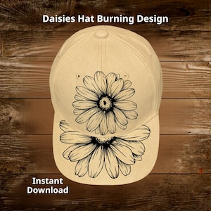 May include: A beige baseball cap featuring a black and white daisy design. The cap has the text "Daisies Hat Burning Design" and "Instant Download". The daisy design is on the front of the cap.