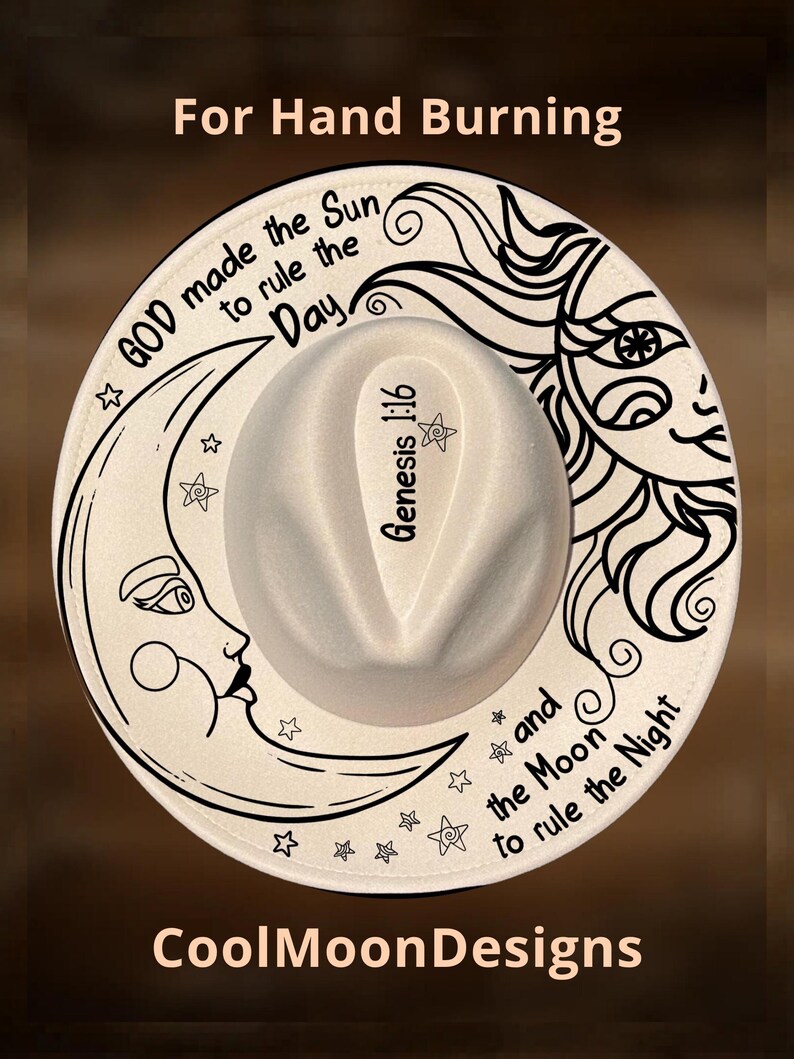May include: A cream-coloured fedora hat featuring black line art of a sun and a crescent moon. The text reads: GOD made the Sun to rule the Day, and the Moon to rule the Night, with Genesis 1:16 printed on the crown. The top text says For Hand Burning.