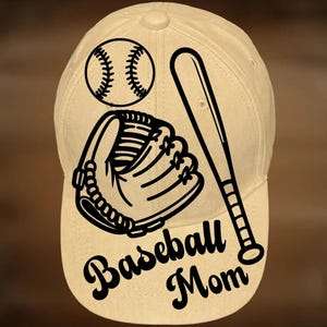 May include: A beige baseball cap with a black baseball, glove, and bat design. The words "Baseball Mom" are written in a script font. The text "For Hand Burning" and "CoolMoonDesigns" are also visible.