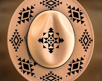 May include: A tan felt hat featuring a black geometric pattern printed on the crown and brim. The text "For Hand Burning" appears at the top, and "CoolMoonDesigns" is printed at the bottom. The hat has a dark band around the crown.