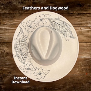 May include: A cream-colored fedora hat with a decorative black feather and floral design. The hat features the text "Feathers and Dogwood" and "Instant Download". The hat is set against a wooden background.