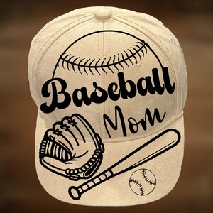 May include: A beige baseball cap with a black baseball graphic, baseball glove, bat, and ball. The words "Baseball Mom" are printed in black script across the front of the cap.