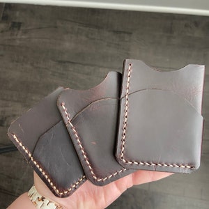 Dark, handmade leather cardholder