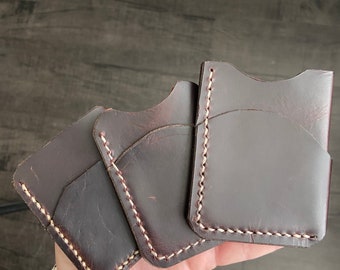 Dark, handmade leather cardholder