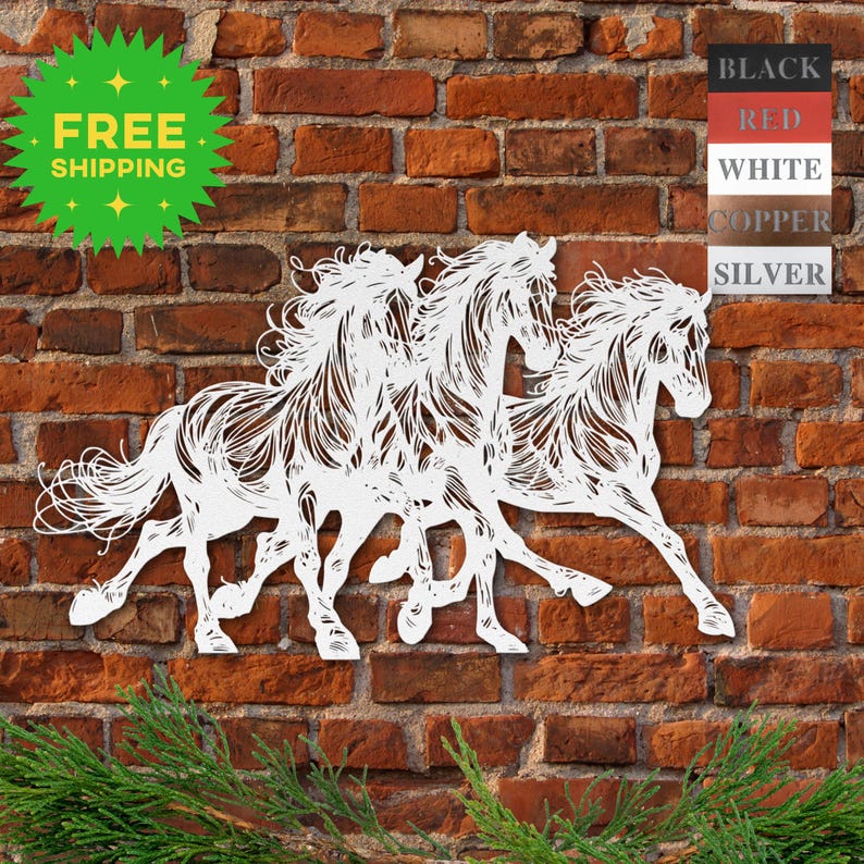 May include: Three white metal horses running in a row, with intricate details in their manes and tails. The horses are mounted on a brick wall.