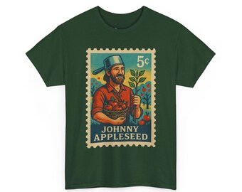 May include: Dark green t-shirt featuring a vintage-style postage stamp design. The stamp depicts a man with a beard, holding apples and a sapling, with the text "JOHNNY APPLESEED" and "5¢".