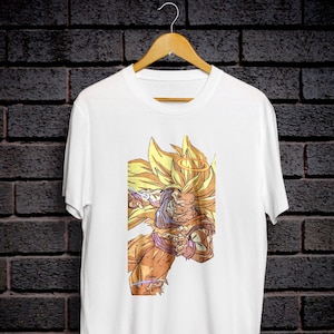 May include: White t-shirt featuring a graphic print of a yellow-haired anime character with a halo. The character is in a fighting pose.