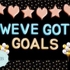 May include: A black background with gold stars and a blue and gold balloon banner that reads "WE'VE GOT GOALS". There are also gold and white balloons on each side of the banner.
