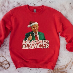 クリスマスには家に帰るシャツ、トランプ スウェットシャツ、クリスマスを再び素晴らしいものにするシャツ、おもしろいトランプ スウェット、クリスマス トランプ シャツ