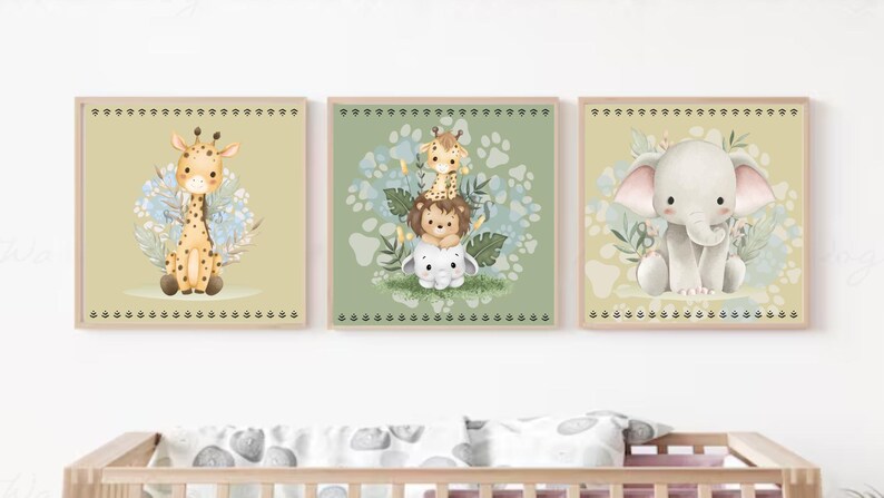 May include: Set of three framed nursery art prints featuring adorable watercolor illustrations of safari animals. The prints include a giraffe, a stack of animals, and an elephant, all set against a soft, neutral background with floral accents.