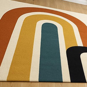 May include: A rectangular area rug with a retro rainbow design. The rug features a cream-colored background with arched stripes in rust, yellow, teal, and black. The rug is made of a soft, textured material.