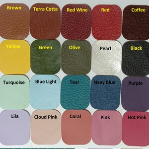 May include: A color chart of 20 different leather swatches. The swatches are arranged in four rows of five. The colors are: Brown, Terra Cotta, Red Wine, Red, Coffee, Yellow, Green, Olive, Pearl, Black, Turquoise, Blue Light, Teal, Navy Blue, Purple, Lila, Cloud Pink, Coral, Pink, and Hot Pink.