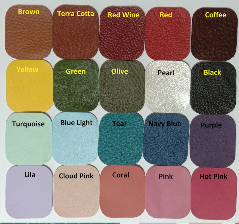 May include: A color chart of 20 different leather swatches. The swatches are arranged in four rows of five. The colors are: Brown, Terra Cotta, Red Wine, Red, Coffee, Yellow, Green, Olive, Pearl, Black, Turquoise, Blue Light, Teal, Navy Blue, Purple, Lila, Cloud Pink, Coral, Pink, and Hot Pink.