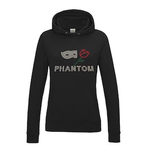 May include: Black hooded sweatshirt with a rhinestone design of a mask and rose with the word "PHANTOM" underneath.