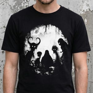 Mothman and Bigfoot shirt with dark art oddity and lofi horror design. A KAMIOJI weirdcore T-shirt blending gothic clothes and alt clothing vibes. Ideal for creepy scary or weird stuff gifts.
