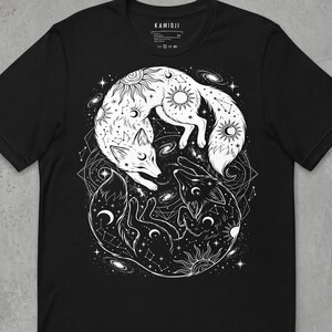 Celestial Yin Yang Fox. White and black foxes surrounded by cosmic motifs.