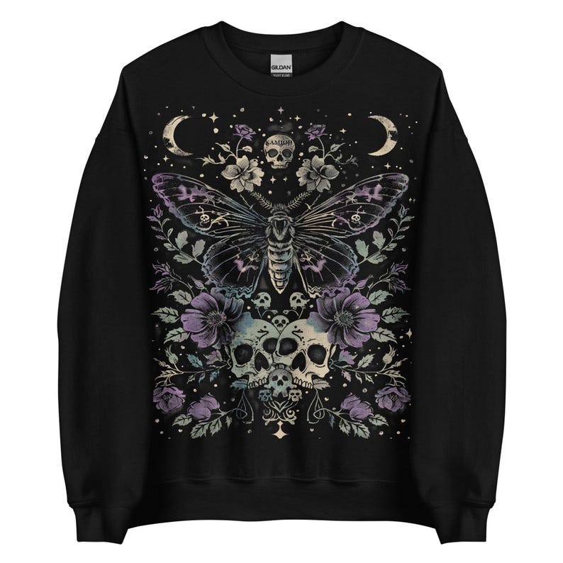 Luna moth sweatshirt with celestial butterfly and floral skull details. A KAMIOJI gothic clothes pullover, ideal for dark cottagecore, pastel goth, and goblincore fashion.